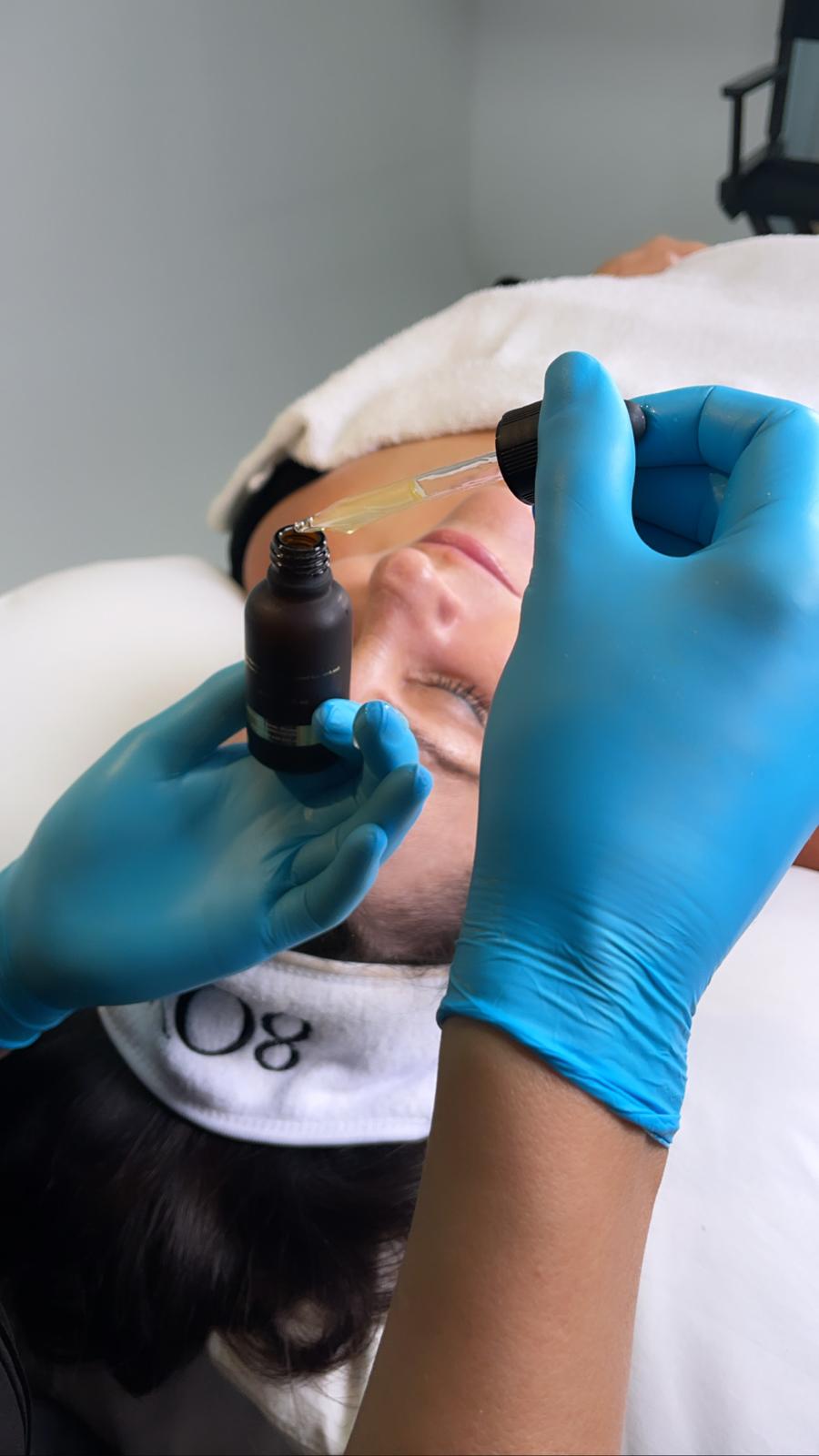 Professional serum applied during a treatment at the studio